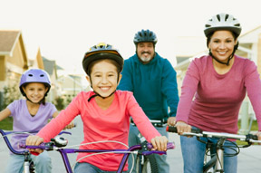 family riding bikes